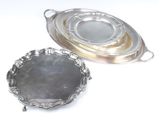 A silver plated Georgian style plate 28cm, 2 serving dishes, a salver and a 2 handled tray 