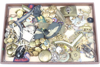 A quantity of World War Two and later army badges and buttons