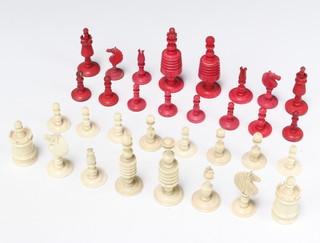 A 19th Century turned, carved and stained ivory chess set, the king 9cm 