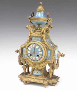 Japy Freres, a French 19th Century 8 day  striking mantel clock with porcelain dial, contained in a Sevres style porcelain and gilt mounted case surmounted by a lidded urn, striking on a bell, the back plate marked 1177 Japy Freres, 10 PR.Mou....   (no pendulum or key) 