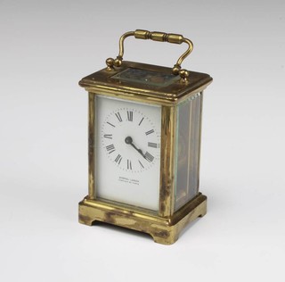 A French 8 day carriage timepiece with enamelled dial and Roman numerals contained in a gilt metal case, the dial marked Gabriel London Fabrique de Paris, complete with key 11cm x 8cm x 6.5cm 