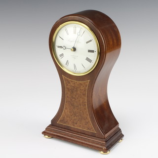 Knight and Gibbins, a Victorian style striking clock with enamelled dial and Roman numerals contained an inlaid mahogany balloon shaped case, raised on bun feet 
