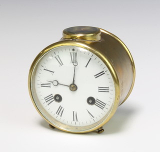 A 19th Century striking mantel clock having a 9cm circular dial with Roman numerals, striking on a bell, contained in a gilt metal circular drum case 