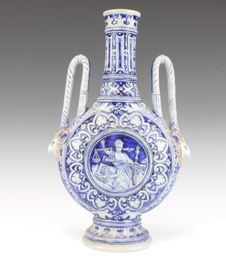 A 19th Century German 2 handled moon shaped vase decorated with figures having rams head handles 50cm 