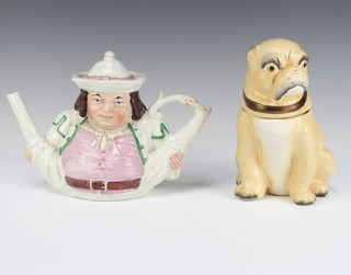 A Victorian Staffordshire teapot in the form of a gentleman with outstretched legs together with a biscuit barrel and lid in the form of a pug dog 