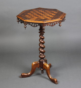 A Victorian octagonal inlaid rosewood chess table with carved and pierced apron, raised on a spiral turned column and tripod base 74cm h x 50cm w x 51cm d 