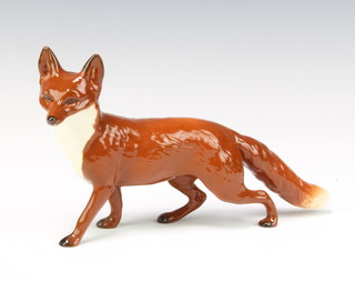 A Beswick figure of a fox standing 1016a, gloss 