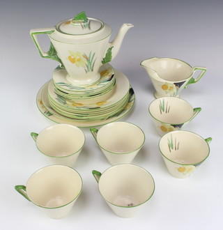 A Burleigh Ware Art Deco tea set decorated with daffodils comprising teapot, milk jug, 6 tea cups, 6 saucers, 6 small plates, 1 medium plate and 1 large plate 