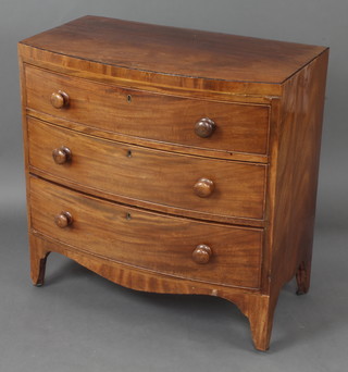 A 19th Century mahogany bow front chest of 3 long drawers with tore handles 84cm h x 83cm w x 46cm d 