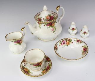 A Royal Albert Old Country Roses pattern tea set comprising teapot, milk jug, sugar bowl, 6 tea cups and saucers, 6 small plates, 6 dessert bowls, a sandwich plate, salt and pepper