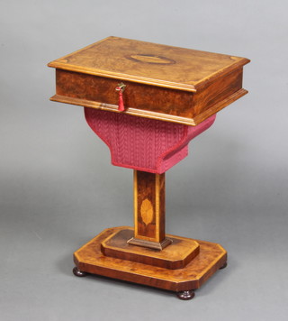 A Victorian rectangular inlaid figured walnut work box with hinged lid revealing a fitted interior, raised on a rectangular column and octagonal stepped base with bun feet 75cm h x 52cm w x 39cm d 