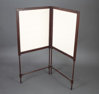 An Edwardian mahogany 2 fold screen raised on turned supports 122cm h x 58cm when closed by 115cm when open  
