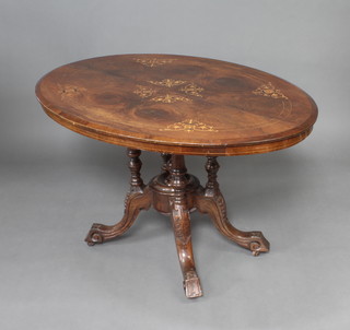 A Victorian oval figured walnut Loo table with quarter veneered top, raised on 4 turned columns and a tripod base 70cm h x 118cm w x 85cm d 