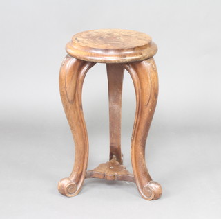 A circular mahogany jardiniere stand raised on cabriole supports 56cm x 31cm 