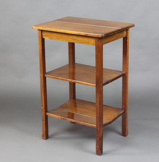 A rectangular walnut occasional tables raised on square supports 72cm h x 49cm w x 38cm d