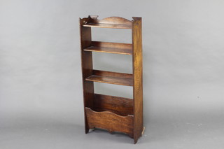 A 1930's oak 3 tier bookcase, the base incorporating a Canterbury 107cm h x 50cm w x 17cm d 