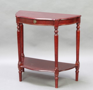 A Georgian style mahogany demi-lune side table fitted a drawer above an undertier, raised on turned supports 77cm h x 38cm 