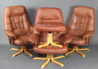 Three beech framed Stressless style armchairs upholstered in brown leather together with a matching footstool (some wear) 