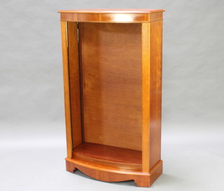 A Georgian style yew bow fronted bookcase fitted adjustable shelves 133cm h x 76cm w x 36cm d 