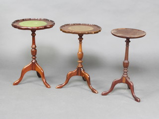 A circular Georgian style mahogany wine table on a pillar and tripod base 51cm x 37cm together with 2 mahogany style wine tables with bracketed borders, raised on a tripod base 52cm h x 35cm w 
