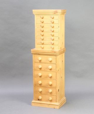A Victorian style pine collectors chest fitted 14 drawers with tore handles 125cm h x 37cm w x 29cm d