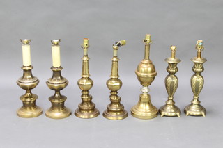 A pair of gilt metal table lamps 52cm x 17cm and 2 other pairs 49cm x 15cm and 41cm x 15cm, 2 gilt metal table lamps 54cm x 17cm and a turned wooden table lamp 39cm x 20cm 