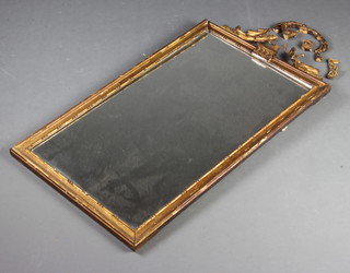A 19th Century rectangular plate mirror contained in a decorative gilt frame 97cm x 50cm 