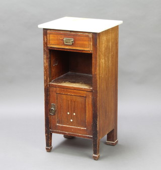 An Art Nouveau Continental mahogany bedside cabinet with white veined marble top fitted a drawer above a recess with cupboard and drawer, on square tapered supports 84cm h x 41cm w x 39cm d 