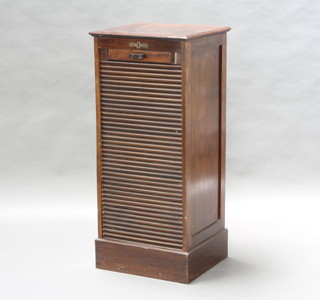 An Edwardian mahogany filing cabinet fitted 9 shallow drawers enclosed by a tambour shutter 110cm h x 49cm w x 44cm d 