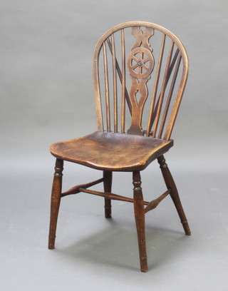 A 19th Century elm stick and wheel back chair 
