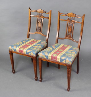 A pair of Victorian inlaid rosewood slat and bar back bedroom chairs 