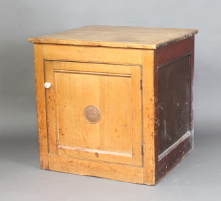 A Continental pine food cabinet enclosed by panelled door 74cm x 73cm w x 68cm d