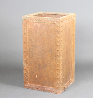 A garden planter in the form of a studded metal tank 80cm h x 44cm w x 44cm d 
