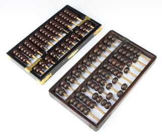 Two Chinese wooden abacus 3 cm x 31cm x 19cm and 3cm x 30cm x 16cm together with a square red embroidered altar cloth panel 93cm x 93cm