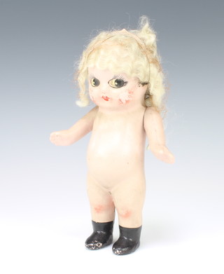 A metal framed model doll 22cm 