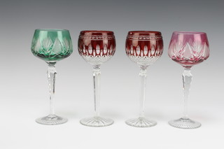 Two pairs of coloured hock wine glasses