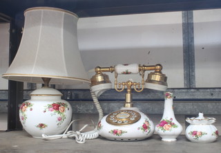A Royal Albert Old Country Rose pattern telephone, ditto table lamp, specimen vase and jar and cover 