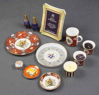 A Royal Worcester easel photograph frame, a pair of Royal Worcester Millennium candle snuffers and various other decorative Worcester items