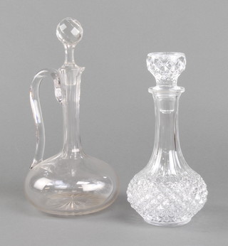 An Edwardian ewer and stopper 28cm, a moulded spirit decanter and stopper 