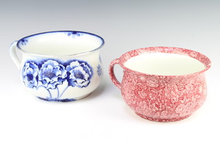 A Royal Doulton chamber pot decorated with flowers, a ditto with scrolling flowers 