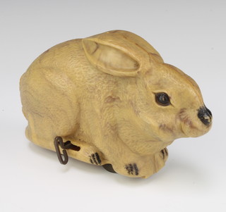 A 1930's plastic clockwork model of a brown rabbit 13cm x 22cm x 7cm 