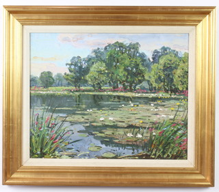 20th Century Russian oil on canvas, indistinctly signed, a lakeside view 38cm x 48cm 