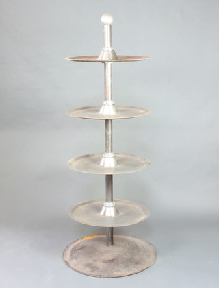 A mid 20th Century industrial circular 4 tier polished steel revolving display carousel 188 cm h x 62cm 