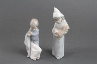 2 lladro figures of children  