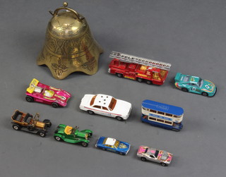 A Chinese brass bell 19cm x 18cm together with a various collection of toy cars