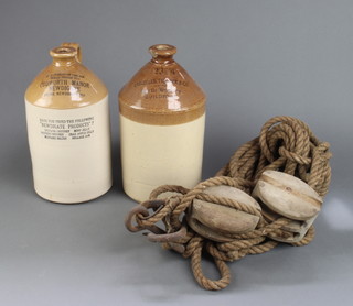 A Cudworth Manor Newdigate ginger beer flagon together with a Castle Brewery flagon and a block and tackle 