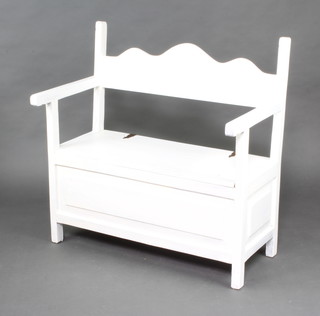 A white painted settle with hinged lid 94cm h x 93cm w x 51cm d 