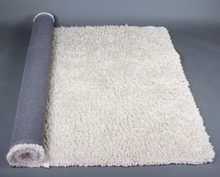 A Chinese white shag pile rug 160cm x 230cm approx. 