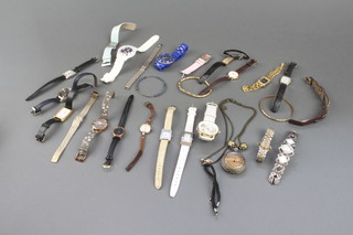 A collection of minor costume jewellery including 2 gold coloured dress rings, a gilt box link chain with pendant  and a collection of watches