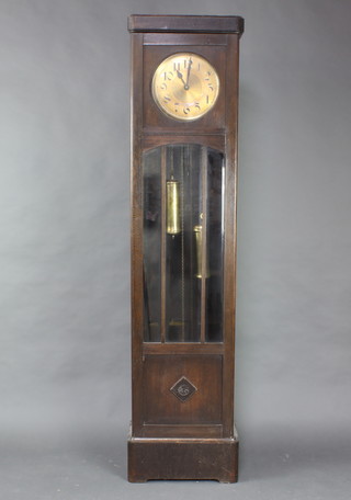 An Art Deco striking longcase clock with 27cm circular brass dial and Arabic numerals contained in an oak case 198cm h 